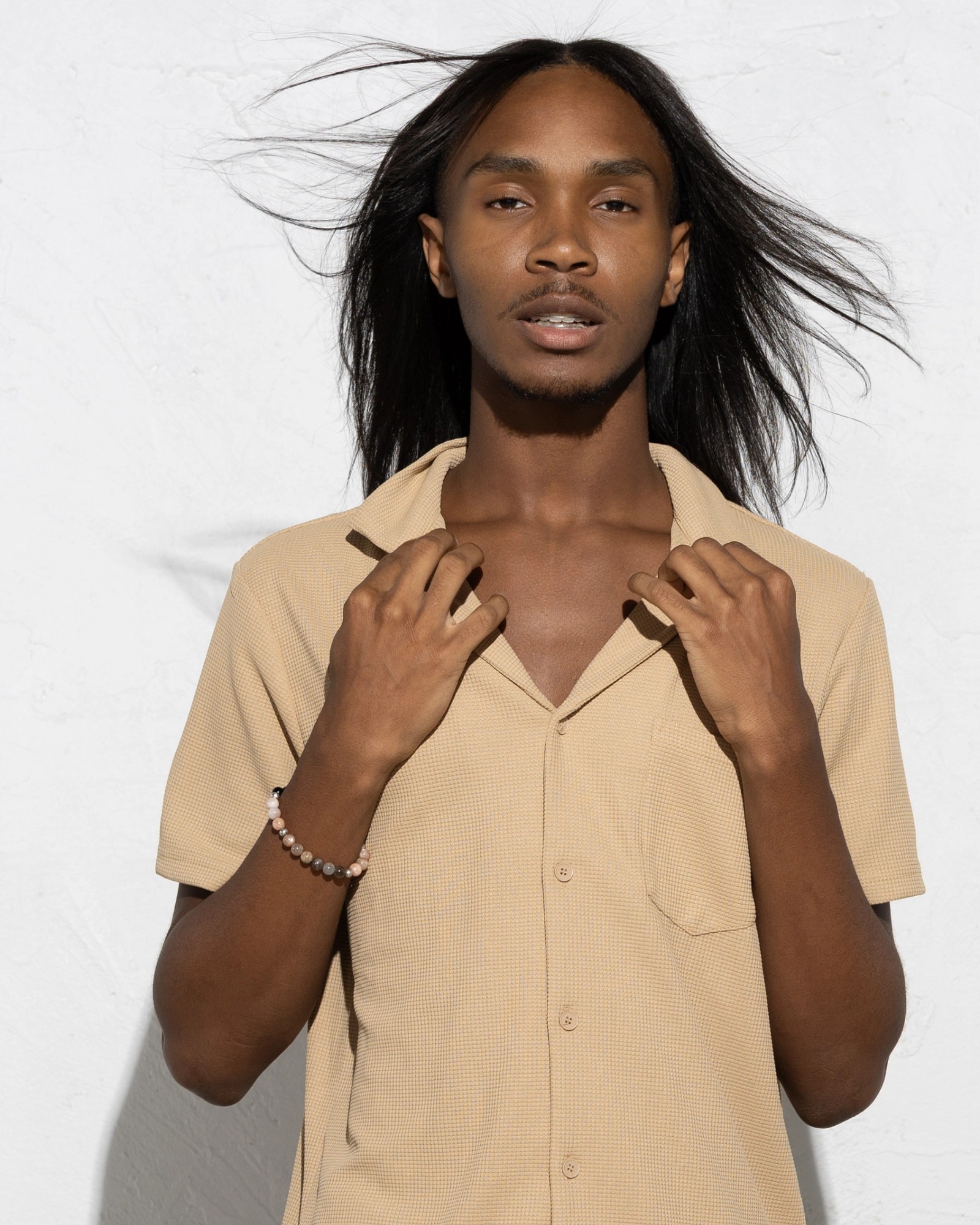 Tan shirt front movement