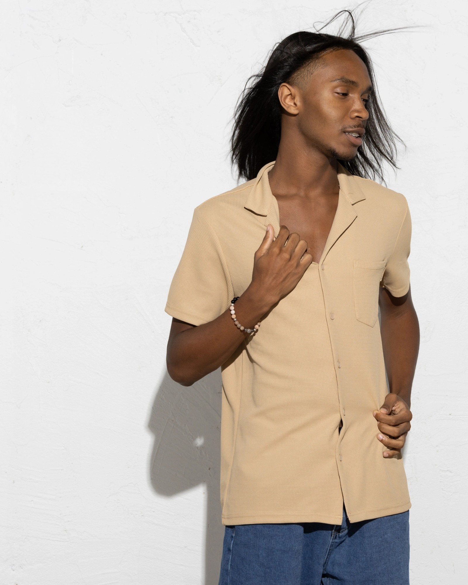 Tan shirt windswept