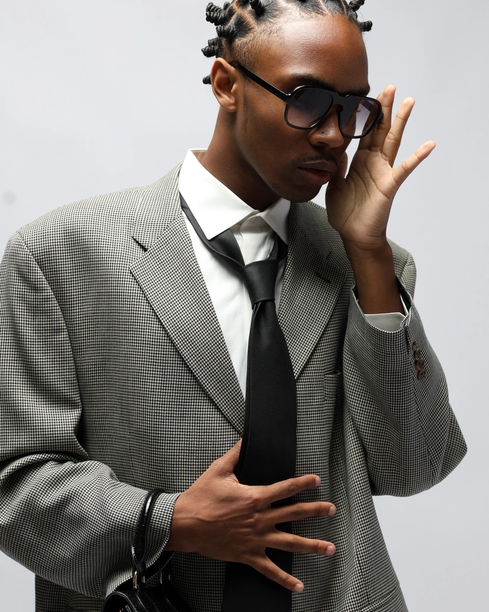 Zerien Croft in tailored houndstooth suit